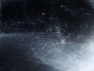 cracked black surface HD wallpaper
